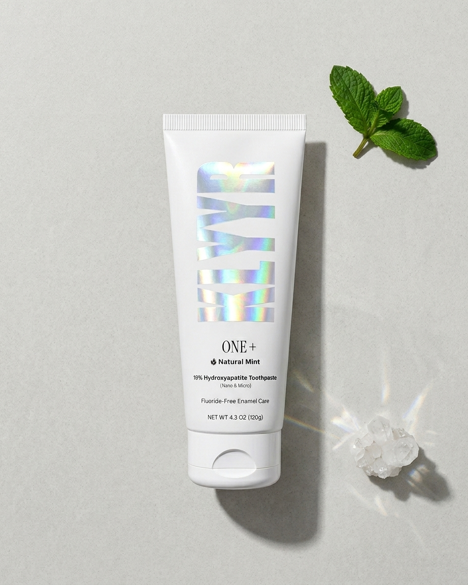 Klyyr hydroxyapatite toothpaste — One+ toothpaste tube in a flat lay suitable for a packing checklist